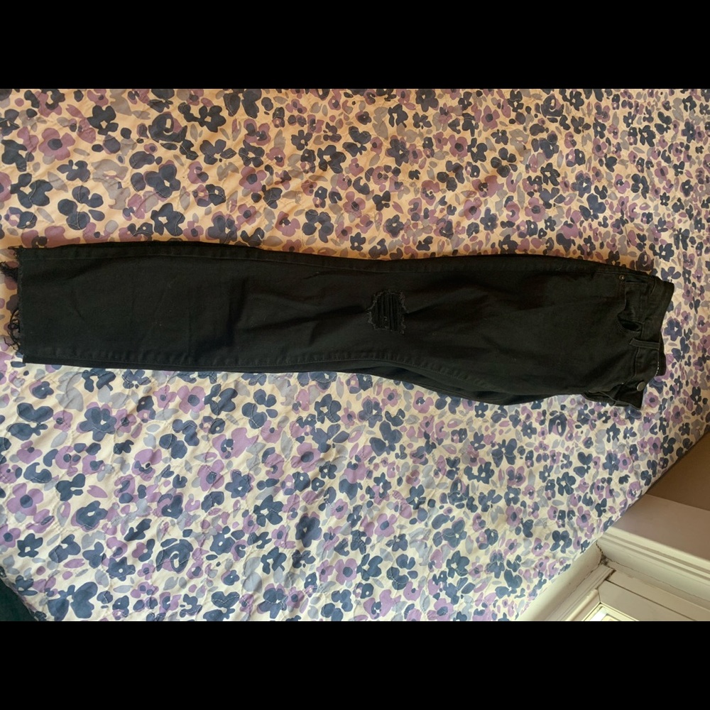 mid rise black ripped jeans with cropped ankle